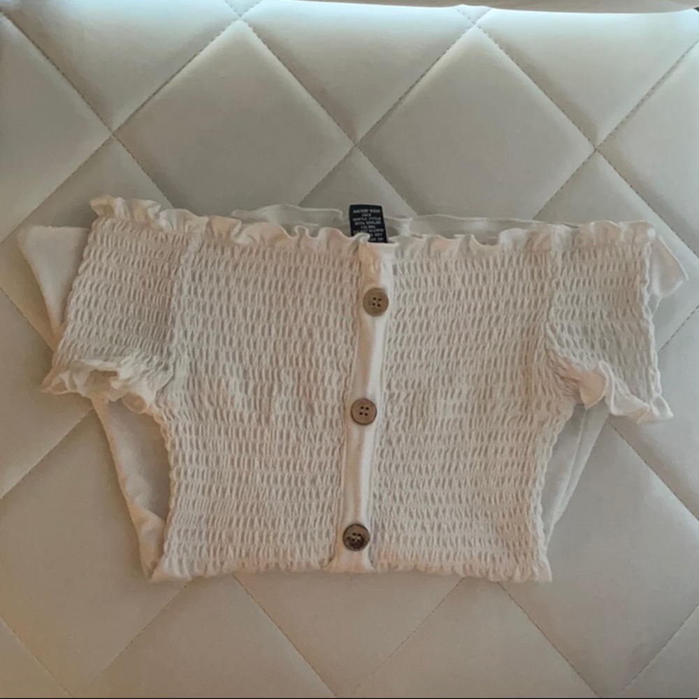 white top with buttons